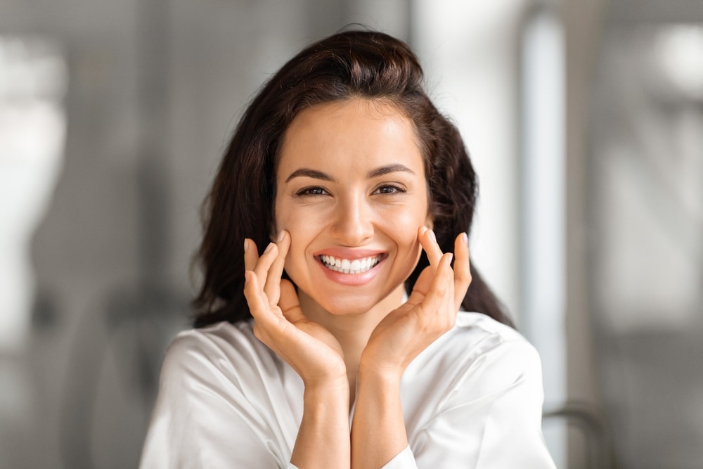 Woman smiling with bright white teeth from ZOOM Teeth Whitening in Boulder, CO